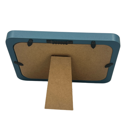 Blue wooden picture frame with sloth figure – front view