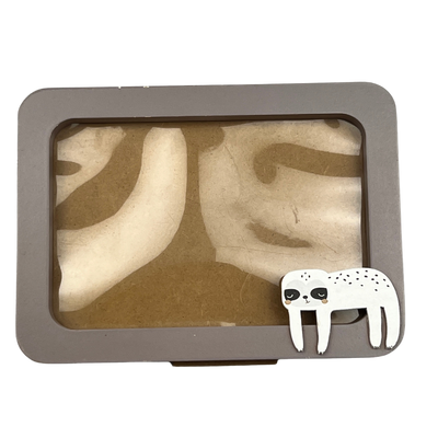 wooden picture frame with sloth figure – front view